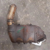 Recertified OEM catalytic converter with inlet pipe and mounting bracket, dark metal
