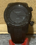 Men's Burberry Sport diving watch with black textured dial and strap, date at 2