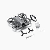 Gray quadcopter drone body with propellers, cable, and spare parts