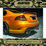 Plastic rear boot spoiler wing with black accents, mounted on car trunk