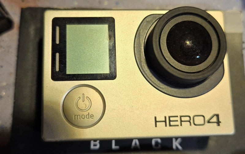 GoPro HERO4 action camera with LCD screen and front lens