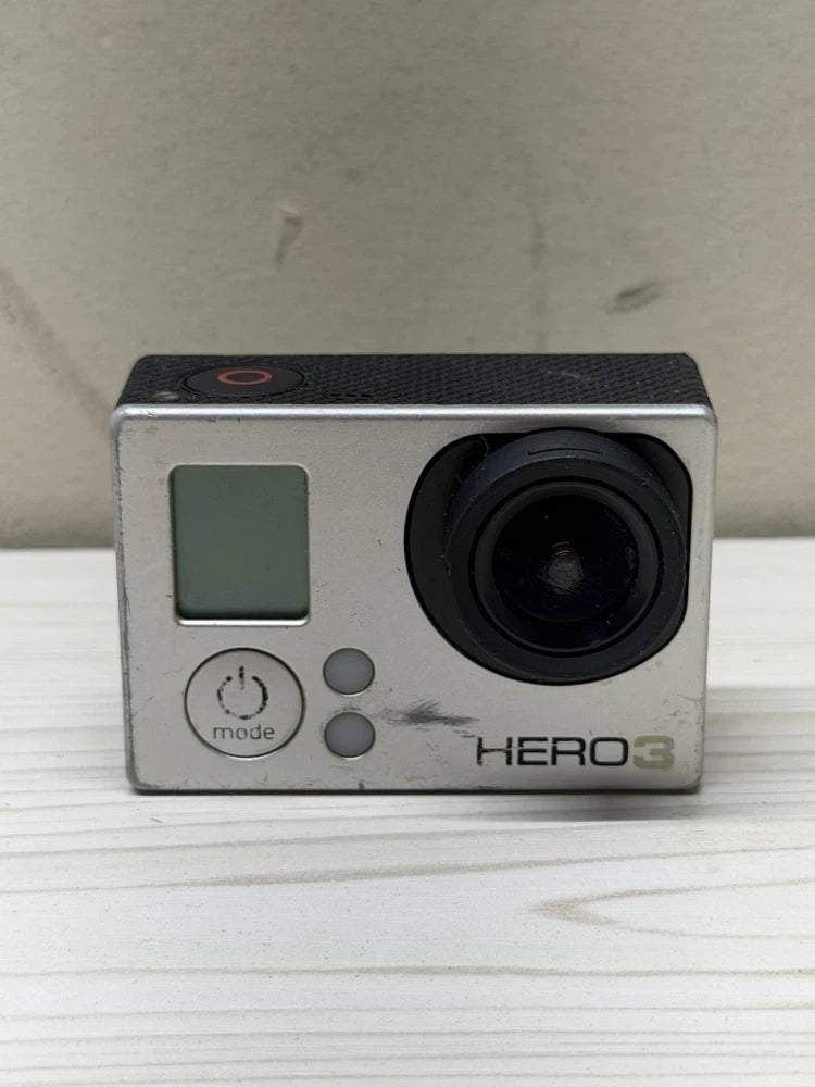GoPro HERO3 action camera with black lens and small LCD screen