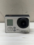 GoPro HERO3 action camera with black lens and small LCD screen