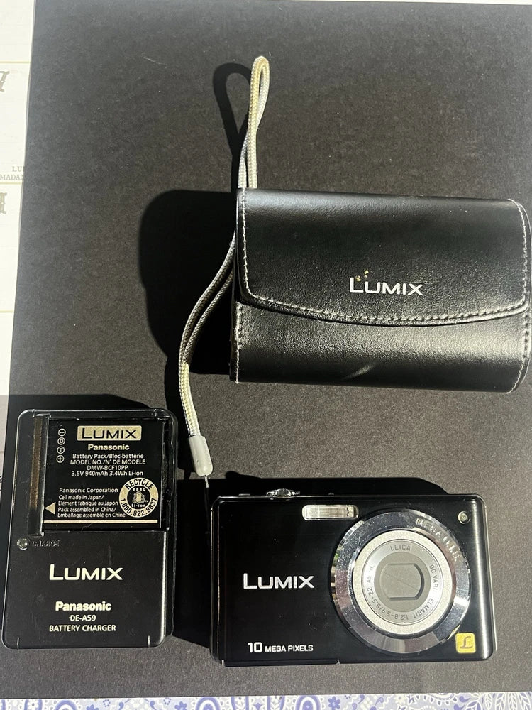 Panasonic Lumix compact camera kit: black camera, LUMIX case, battery charger