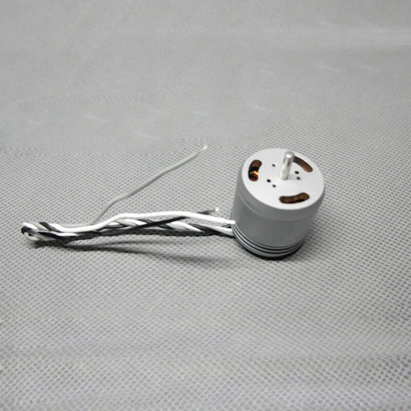 Cylindrical drone motor with attached wiring and terminal pins