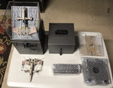 T-65 X-Wing battle drone with open-box accessories and foam inserts