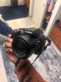 Panasonic LUMIX FZ-600 Bridge Camera 25-600mm Lens, Built-in Flash, Charger