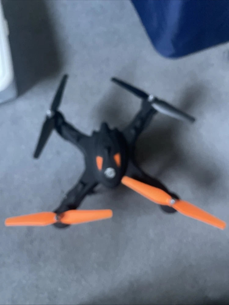 360 Skyview quadcopter drone with four orange propellers, front view.