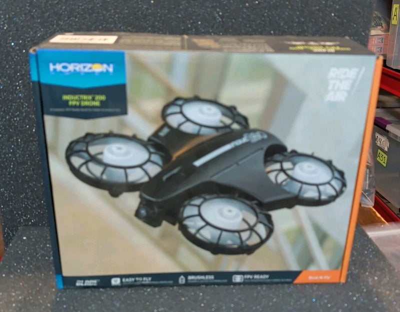 Micro FPV quadcopter drone in retail box, Horizon branding, four-propeller frame