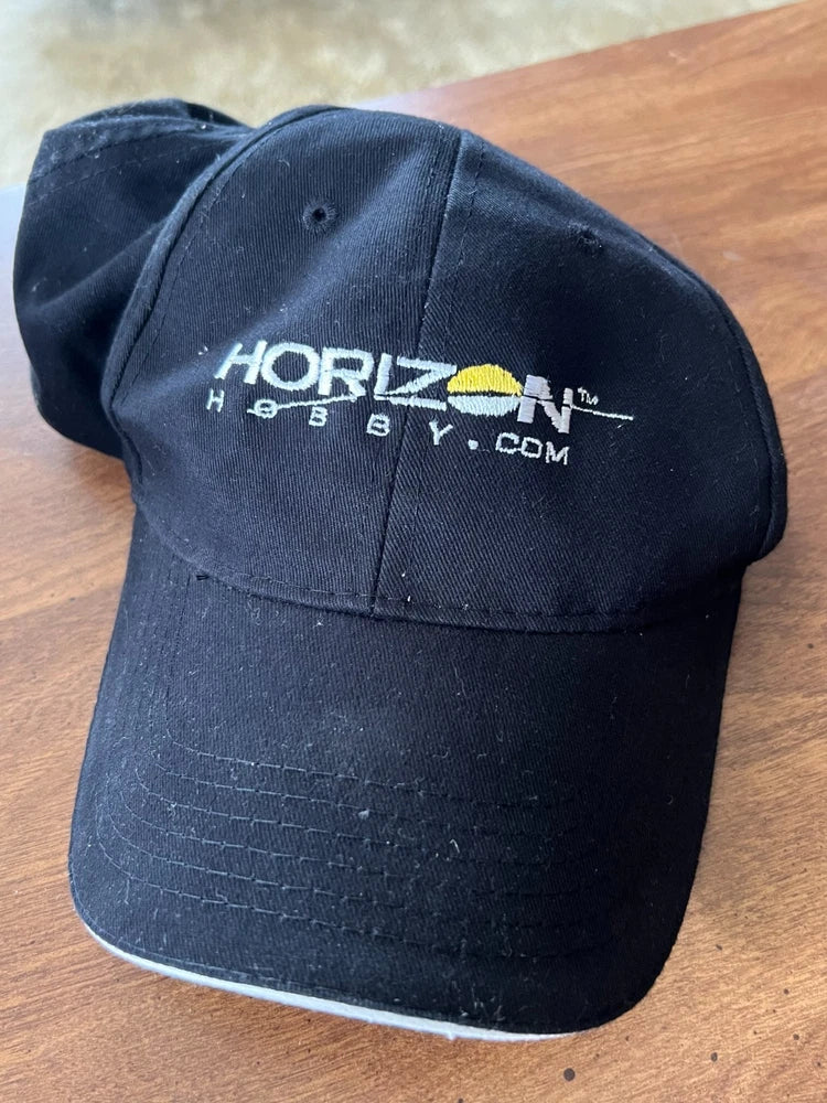 Black baseball cap with Horizon Hobby logo and HORIZONHOBBY.COM text on front