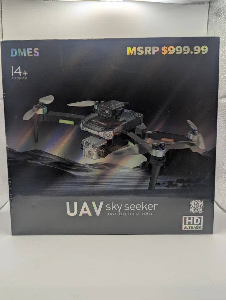 Foldable quadcopter drone with Ultra HD camera on retail box