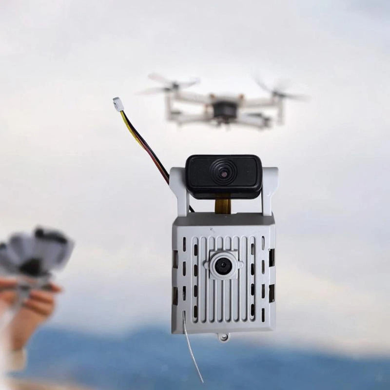 Dual camera module for RC drone, black lens on gray mounting bracket