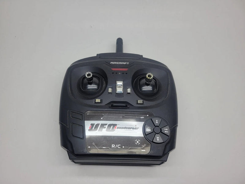 Black R/C drone remote controller with screen and dual control sticks