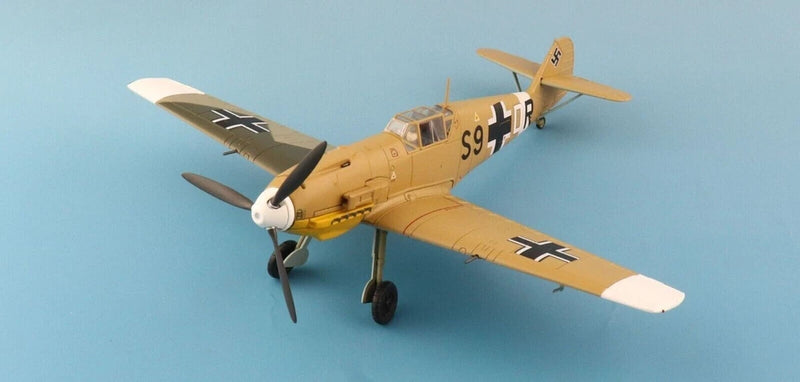 Yellow Messerschmitt BF 109E-7 model airplane with open propeller and landing gear, 1:48