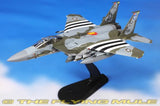 1:72 F-15E Strike Eagle model aircraft on stand, gray/olive with U.S. stripes