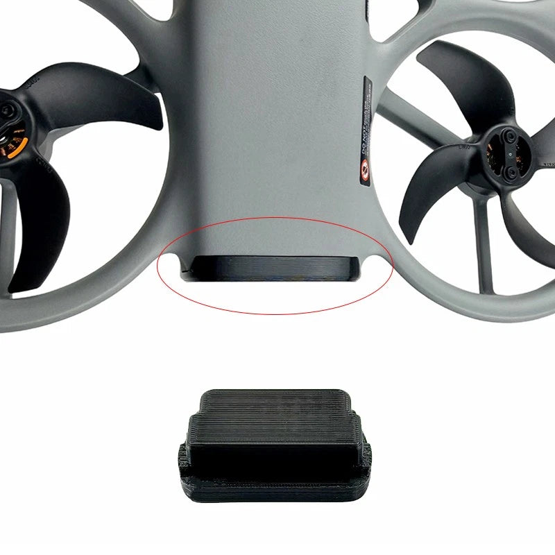 Black textured protective battery compartment cover for drone body