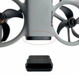 Black textured protective battery compartment cover for drone body