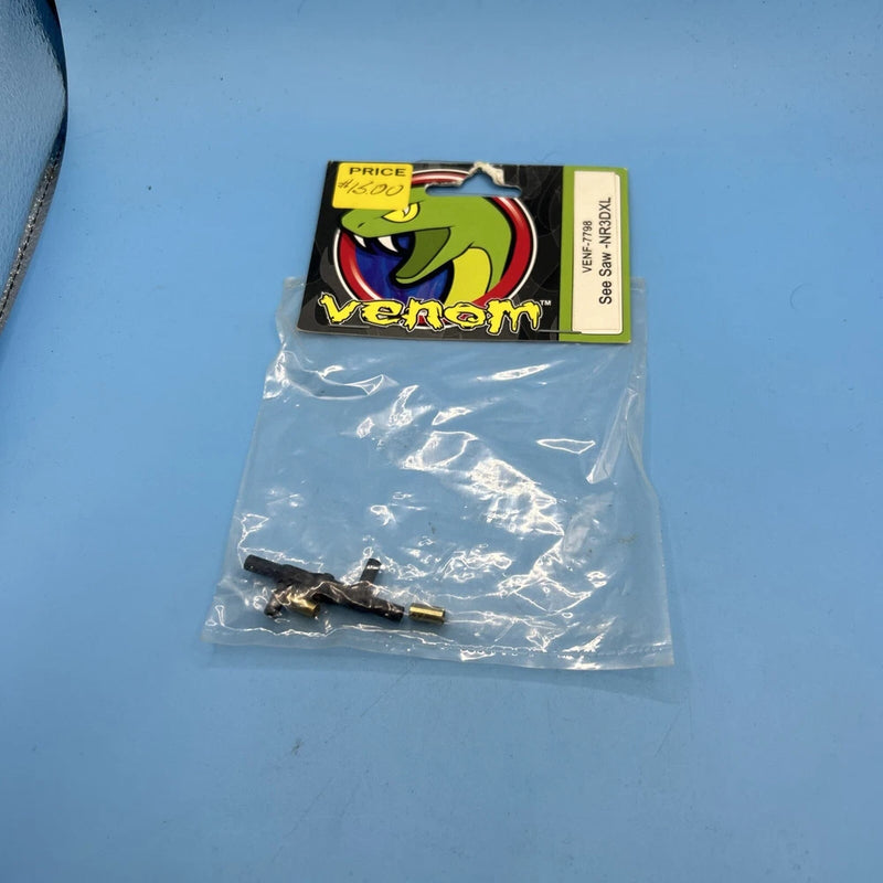 Venom RC helicopter see-saw part in clear plastic bag with labeled card