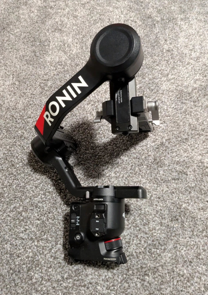 DJI Ronin RS 4 gimbal stabilizer, black handheld device with front camera mount
