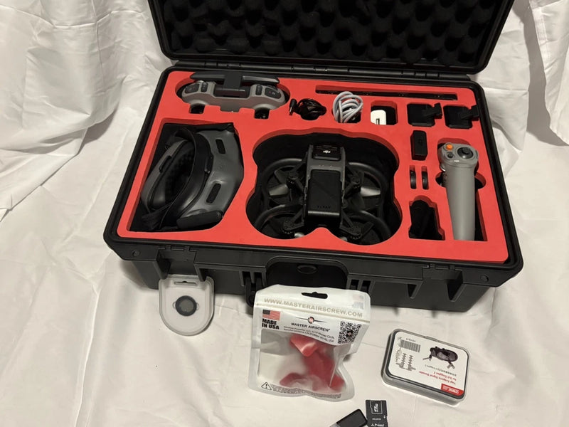 Drone accessory kit in black-and-red hard case with prop guards and controller mount
