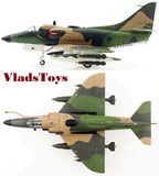 Green and tan camo scale model A-4 Skyhawk jet with landing gear and underwing missiles