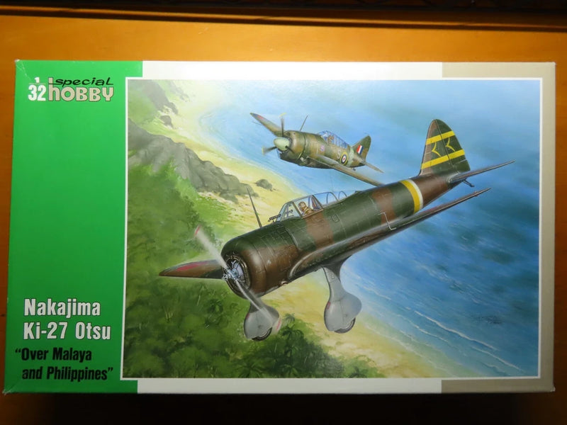 1/32 scale model airplane kit box with green and yellow aircraft artwork