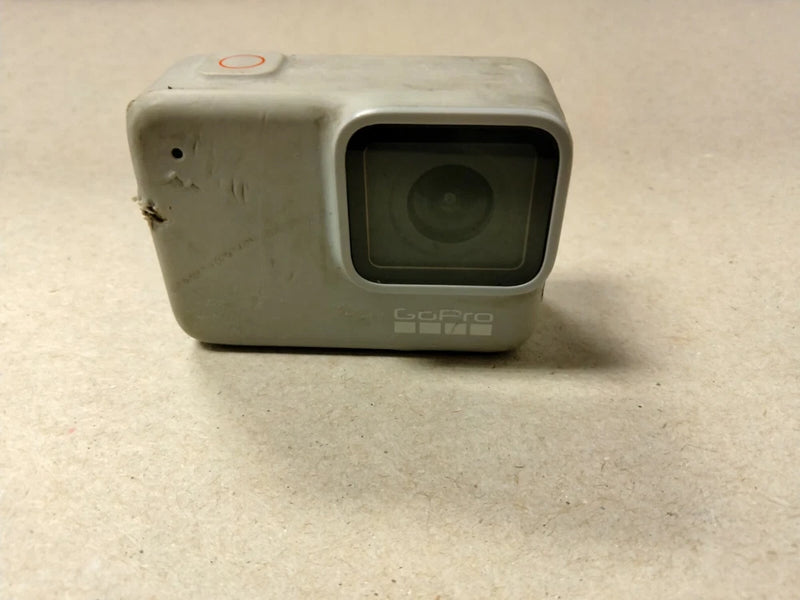 GoPro Hero 7 waterproof action camera, light-colored body with front lens window