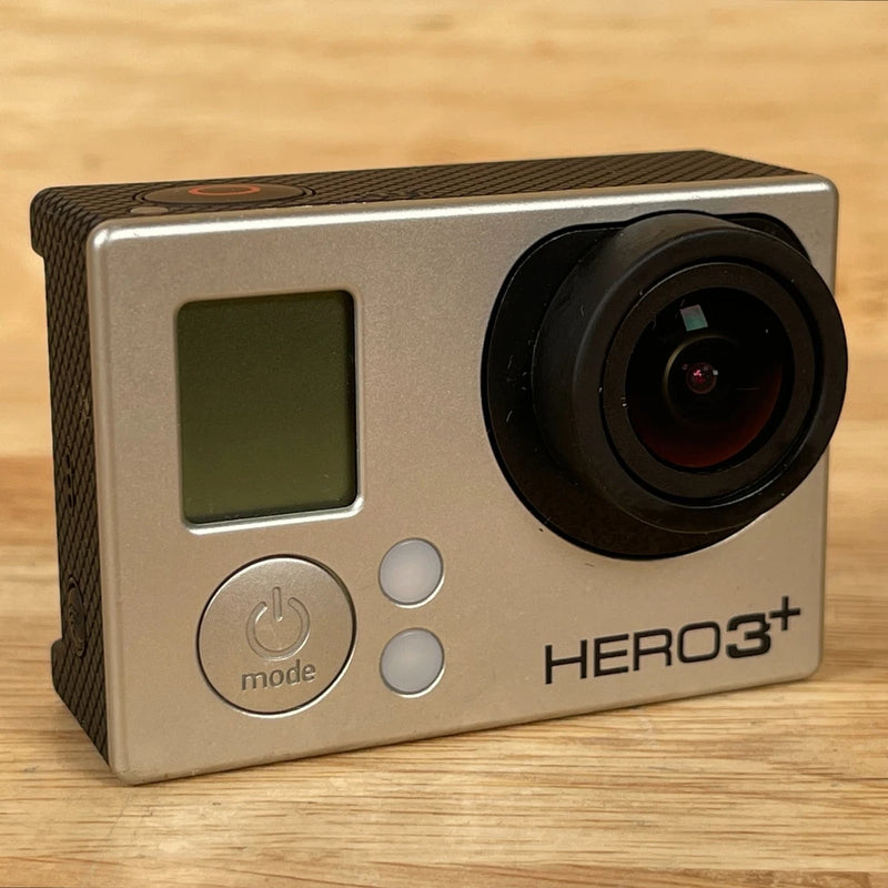 GoPro HERO3+ action camera with black lens and LCD screen, silver body
