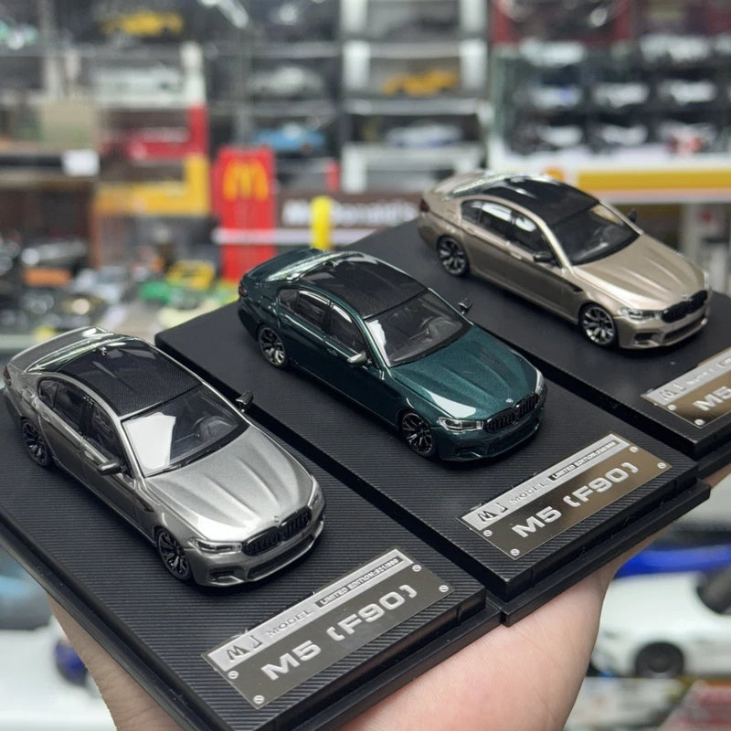 1/64 alloy car model set with three die-cast sports cars on display trays