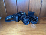 LUMIX G85 with LUMIX G Vario 12-60mm Lens and Olympus M. ZUIKO 25mm 1.8 Lens