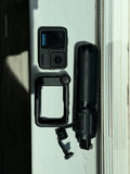 GoPro HERO13 Black action camera in protective housing with attached cylindrical mount
