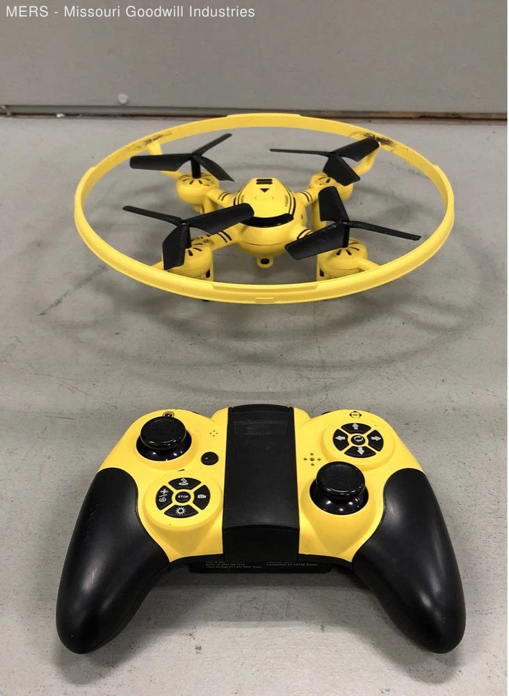 Yellow mini quadcopter drone with black controller
