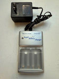 Rapid battery wall charger adapter with transparent AA/AAA charging bay and power plug