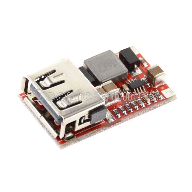 Red USB buck step-down converter module with DC input terminals and voltage regulator