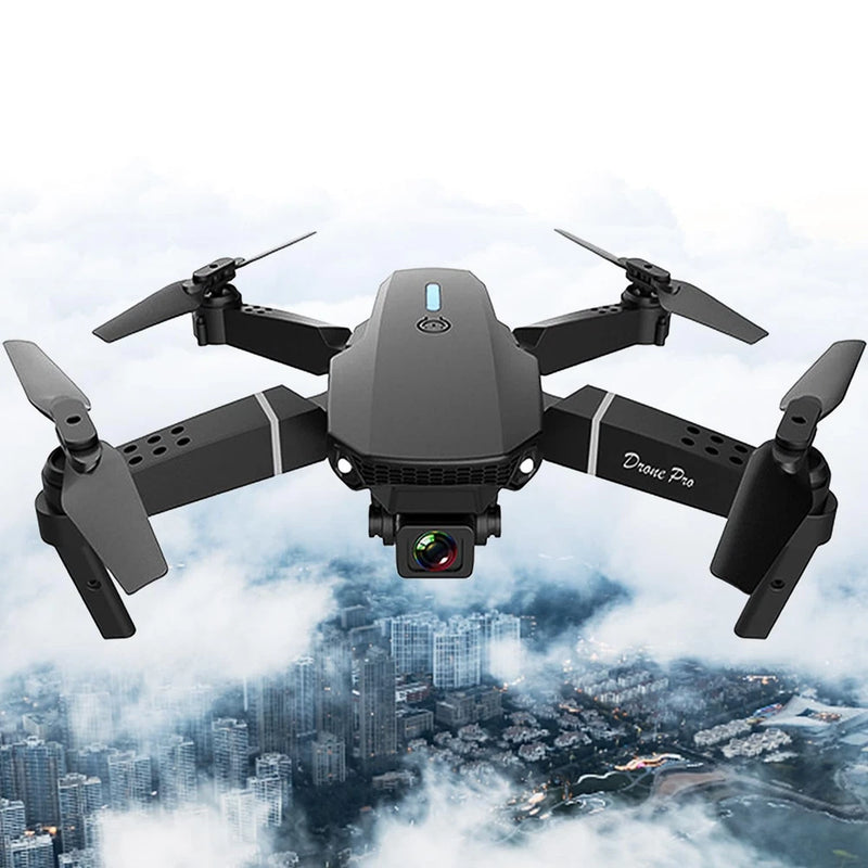 Mini quadcopter drone with camera, dark gray body and four propellers