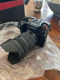 Panasonic Lumix SR1 Camera with 24-105mm Lens, Accessories, and Porta Brace Bag.
