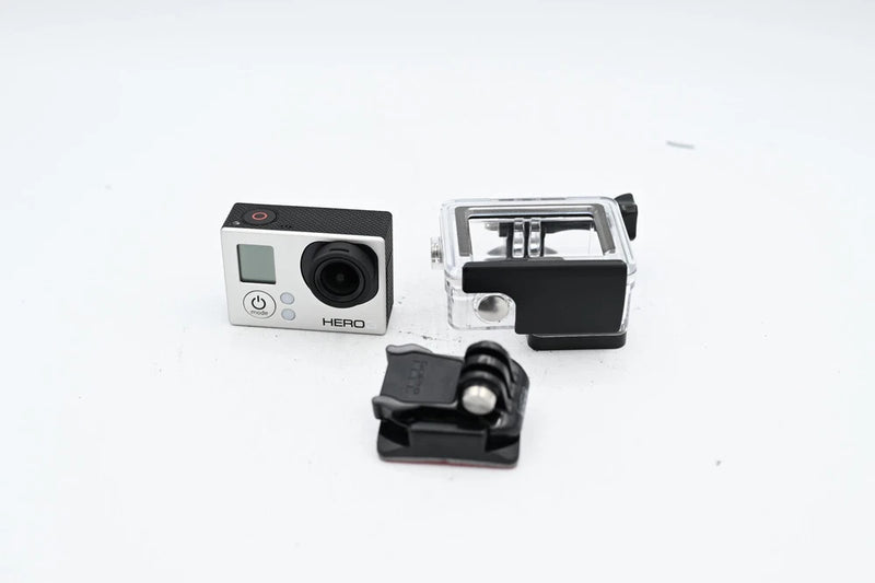Silver GoPro HERO3 action camera with waterproof housing and black mounting bracket