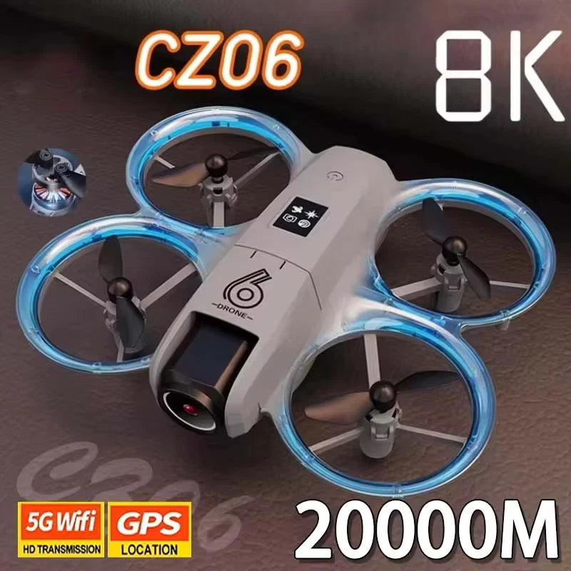 White quadcopter drone with four rotors and blue LED ring lights, camera