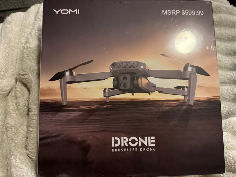 Yomi brushless drone box with illustrated quadcopter and front camera