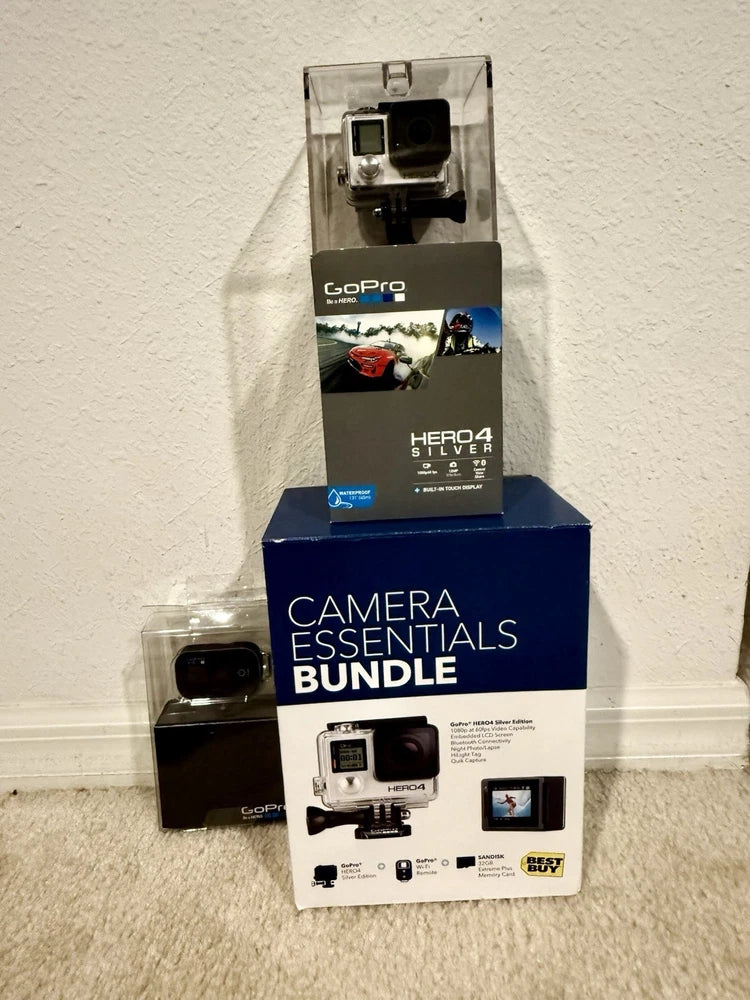 GoPro HERO4 Silver action camera essentials bundle box with mounted camera