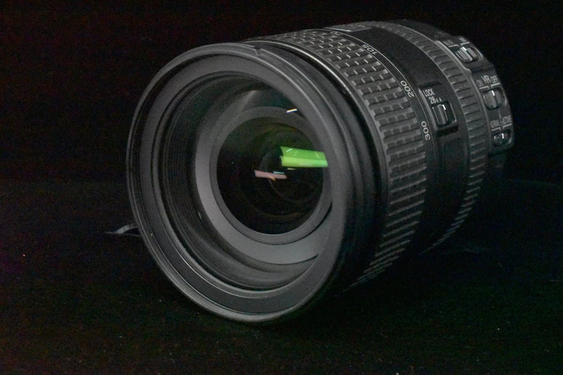 Nikon AF-S FX NIKKOR 28-300mm zoom lens with VR, front and barrel detail