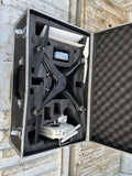 Hard case with foam inserts holding a compact drone and gimbal camera