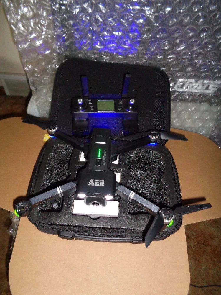 AEE Sparrow 4K drone with camera, in black foam carry case, four prop arms