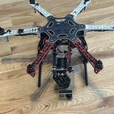Custom quadcopter drone frame with gimbal camera and landing legs