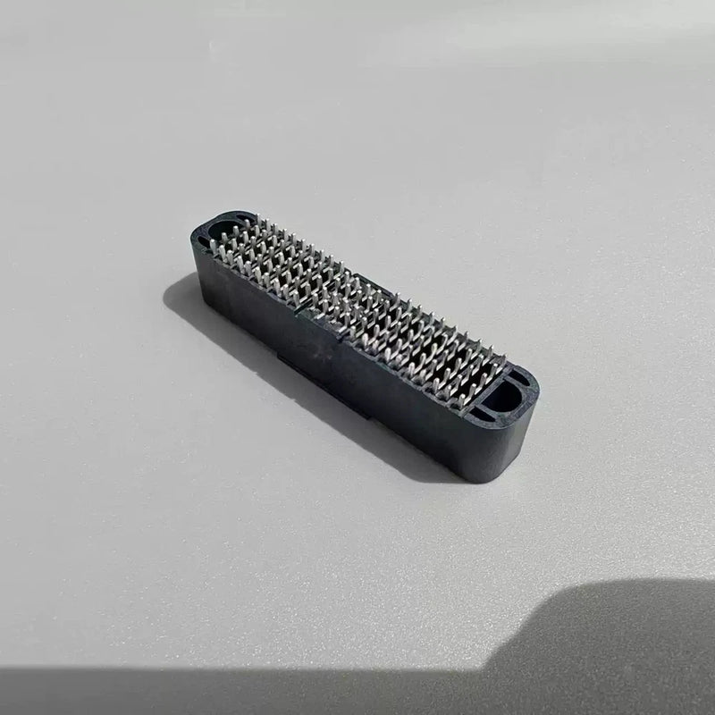 Battery port connector with black plastic housing and silver metal pins