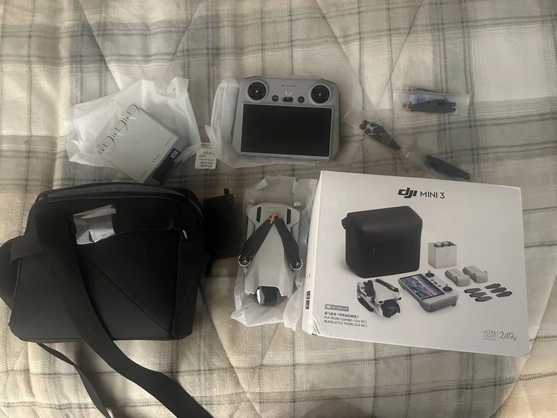 DJI Mini 3 drone quadcopter kit with controller and accessories, open box