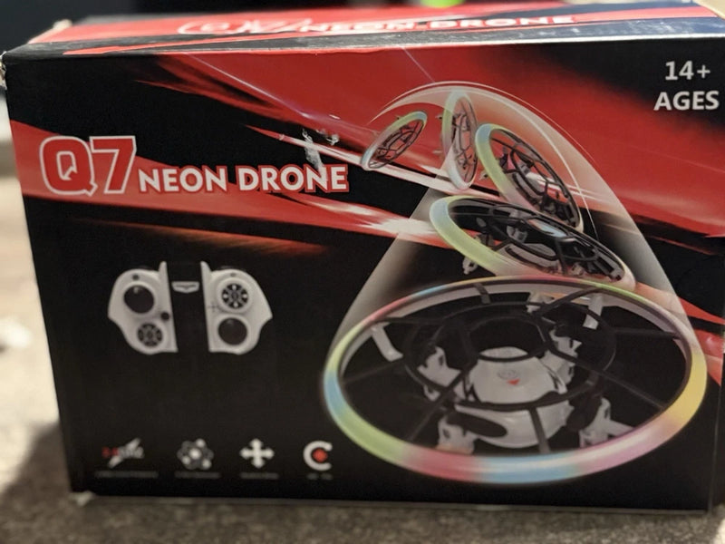 Neon mini drone toy box with illustrated quadcopter and remote controller