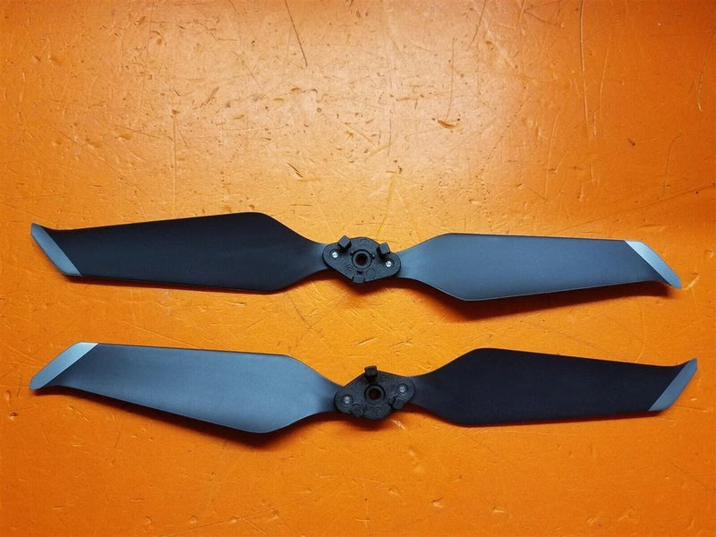 Pair of two-blade DJI Mavic 2 drone propellers: dark gray blades, black hubs