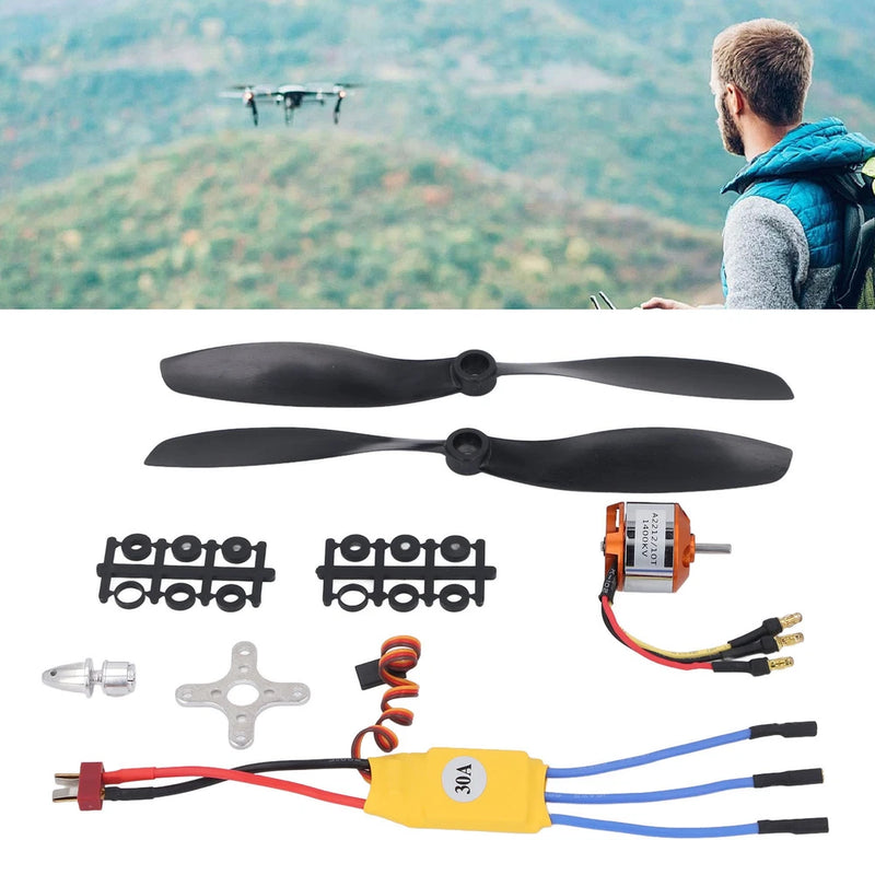 RC drone motor and ESC kit with propellers, mounting parts, and wiring harness