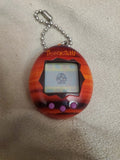 Tamagotchi Sunset Red - Bandai - Model 42800 + New Battery Battery